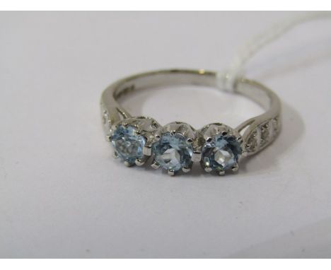 9ct WHITE GOLD TOPAZ &amp; DIAMOND RING, 3 principal well matched blue topaz stones with accent diamonds to each shoulder on 