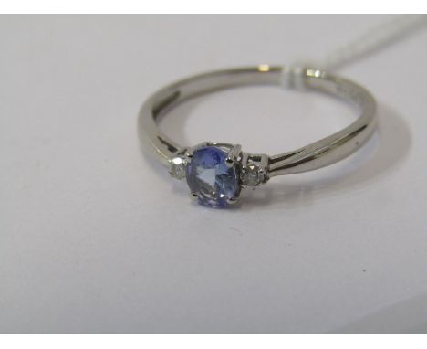 9ct WHITE GOLD TANZANITE &amp; DIAMOND RING, principal oval cut pale tanzanite with accent cut diamonds to each shoulder, siz