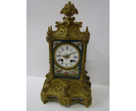 FRENCH ORMOLU MANTEL CLOCK, By Raingo Freres, inset Sevres style bird and floral painted panels, bell strike movement and orn