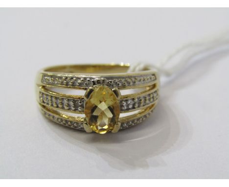 9CT YELLOW GOLD CITRINE &amp; DIAMOND RING, principal oval cut citrine in 4 claw setting, set with accent brilliant cut diamo