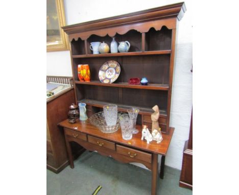 ANTIQUE MAHOGANY DRESSER, open shelf back rack above triple frieze drawer base with brass swan neck handle and chamfered legs