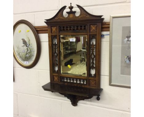 A Victorian rosewood and satinwood inlaid wall mirror and shelf 