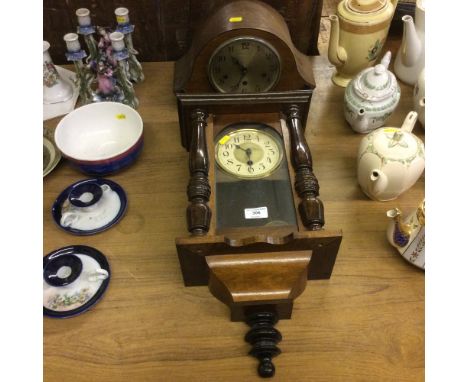 A 1930's three hole mantel clock; and a regulator wall clock 