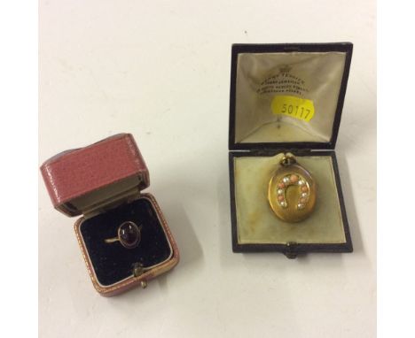 A yellow metal coral and pearl set locket fitted in leather case; together with a 9ct gold pink stone set ring 