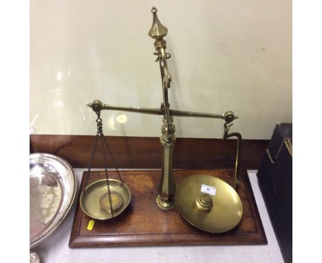 A set of brass scales and weights 