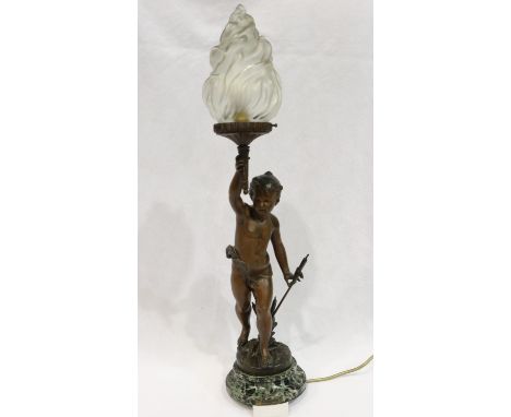 Spelter newel post lamp of a boy holding a flaming torch on a marble case, signed Ferrand, hole to flame shade, H: 69 cm, no 