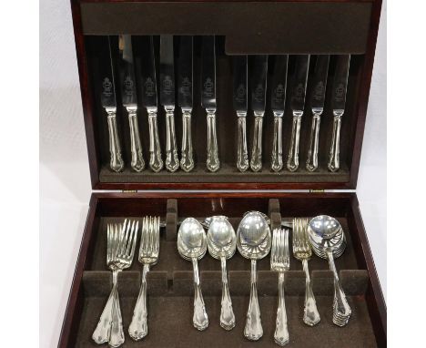 Mahogany cased canteen of stainless steel cutlery in sets of six, lacking one teaspoon. UK P&amp;P Group 3 (£30+VAT for the f