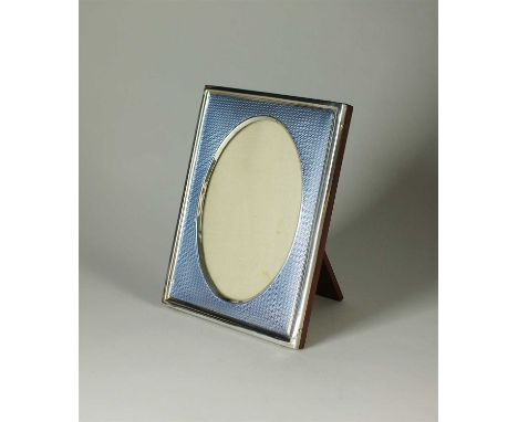 An early 20th century silver and blue guilloche enamel effect frame, James Deakin &amp; Sons, Chester 1910, of rectangular fo