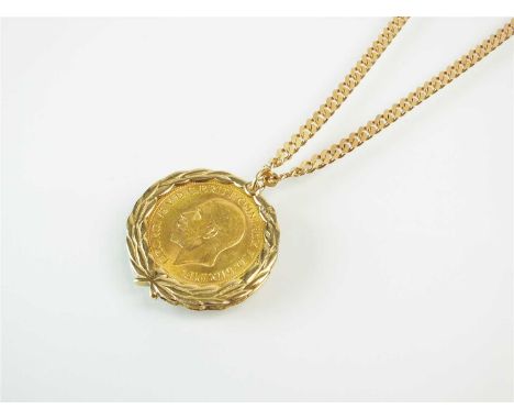 A George V sovereign pendant on chain, the 1931 sovereign within 9ct gold wreath mount, suspended from 9ct gold flat curb lin