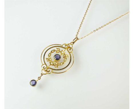An early 20th century sapphire and seed pearl pendant, designed as a central round mixed cut sapphire milligrain set in yello