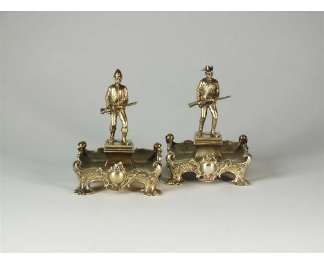 A pair of Edwardian silver gilt figural cigar rests, William Hutton &amp; Sons Ltd, London 1902, each designed as a central '