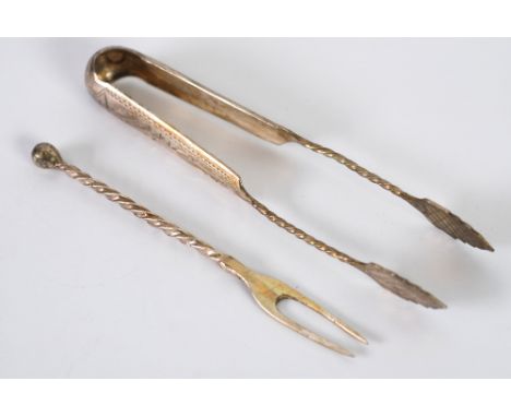 LATE NINETEENTH CENTURY RUSSIAN SILVER SUGAR TONGS, foliate engraved with spirally twisted shafts and flat leaf shaped termin