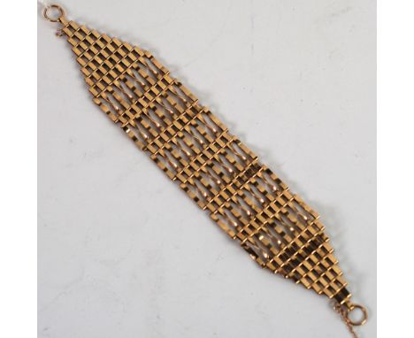 SILVER GILT BROAD NINE BAR GATE PATTERN BRACELET with tapered ends 