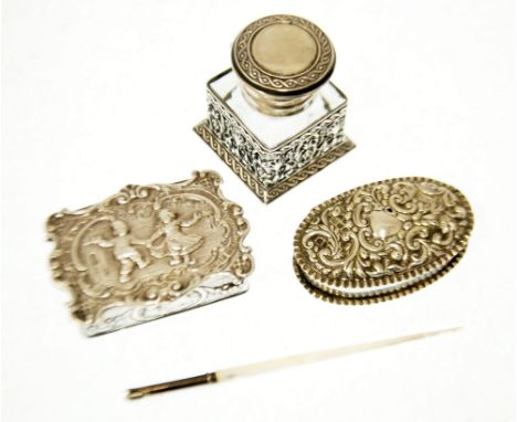 CONTINENTAL SILVER (stamped .925) INKWELL, the pressed glass receiver held within a stamped and pierced base, with hinged cov