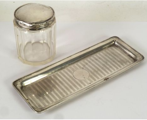 GEORGE V ENGINE TURNED SILVER DRESSING TABLE TRAY of rounded oblong form, 8 1/2" x 3 1/4" (21.6cm x 8.3cm), Birmingham 1919 a