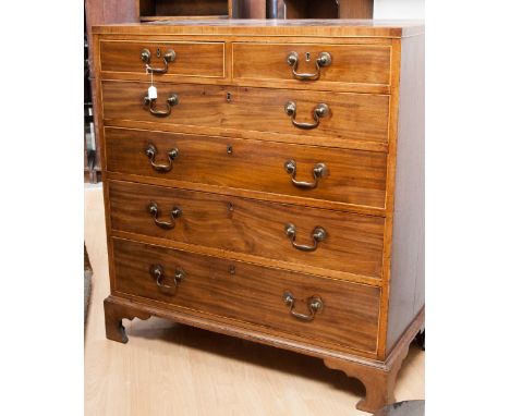 A Georgian mahogany strung chest of drawers, two short over four long graduated drawers, bracket feet, width 100cm