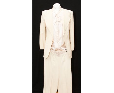 A Sally Woodard cream trouser suit, embroidered on the shoulders and waistband of the trousers, beautifully made , blouse wit