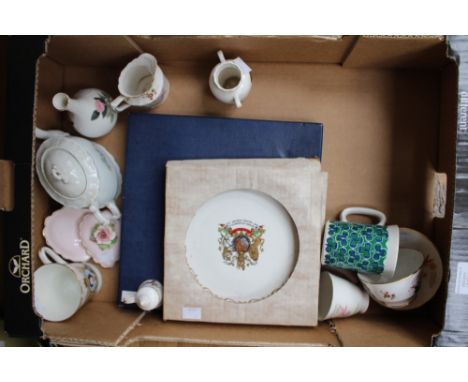 An Islington china 'Flower Fairy' cup and saucer; together with Royal Crown Derby posies cream jug and sugar bowl, Wedgwood, 