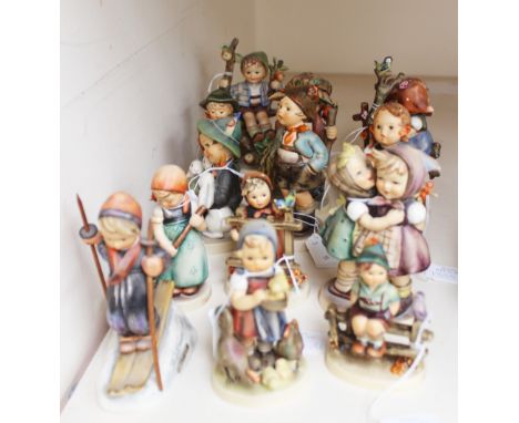 A Hummel collection of fifteen figures and figure groups, all depicting children, including Boy Skiing, Girl in Branch, Boy w