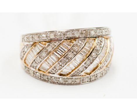 A diamond band ring, set with ninety five diamonds of fifty 8 cut, measuring 2 mm long approx in beaded and channel settings,