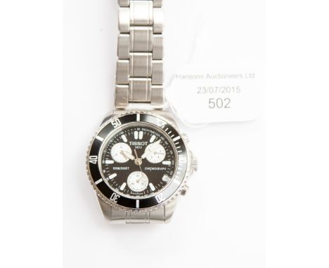 A Tissot chronograph 100m/330ft stainless steel watch, three dials T16.1.486.51 (spare links) boxed 