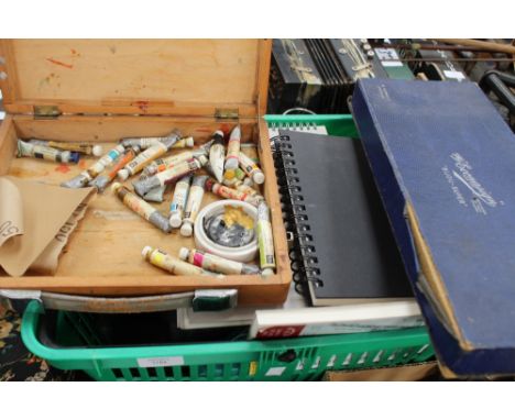 A quantity of oil/watercolour paints, sketch books, drawing sets 