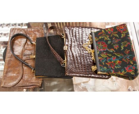A tapestry handbag from the early 1970s a 'crocodile' late 1960s handbag in immaculate condition in dark brown, black brocade