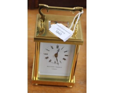 A Matthew Norman brass carriage clock (s.d to glass) black Roman numerals to white face, eight day 