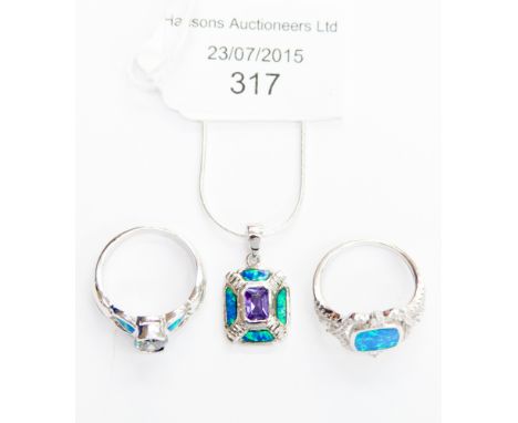 A Blue Opal and White Topaz ladies dress ring, fitted on a Sterling silver shank, a Rainbow coloured Topaz and Opal ring, als