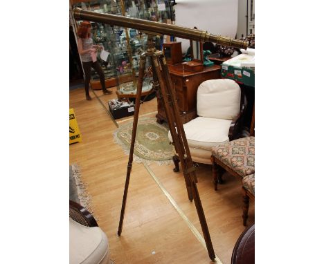 A 20th Century brass telescope on tripod, extending stand 