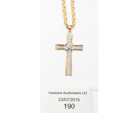 A 9ct yellow and white gold diamond set cruciform pendant from 9ct yellow gold chain, pendant set with twenty one round brill