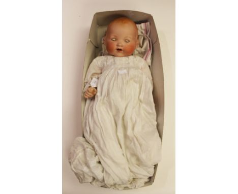 An Armand Marseille bisque head and composition body doll, mould no.351/8.K , with sleeping eyes, open mouth showing bottom t