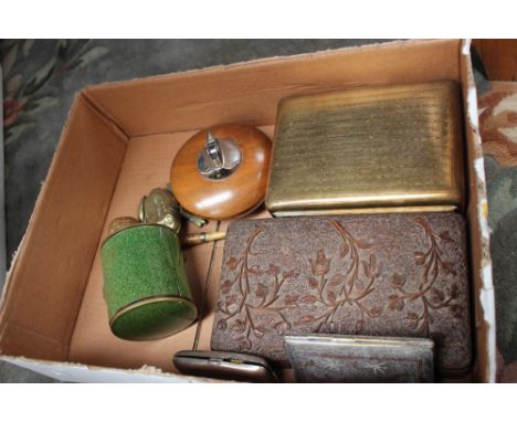 A box of smoking ephemera, including cigarette boxes, silver gilt lined cigarette case, novelty frog ash tray and 'corn on th
