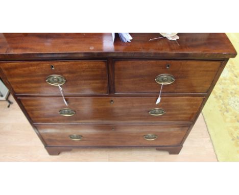 A George III mahogany chest of drawers, fitted with two short over two long graduated drawers, raised on bracket feet, 87 cm 
