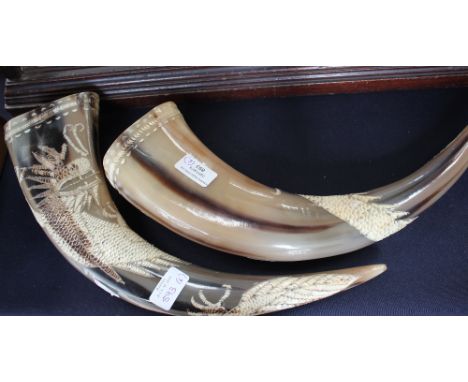 A collection of six various tusks, including resin examples, a cribbage board, horn etc. (6)