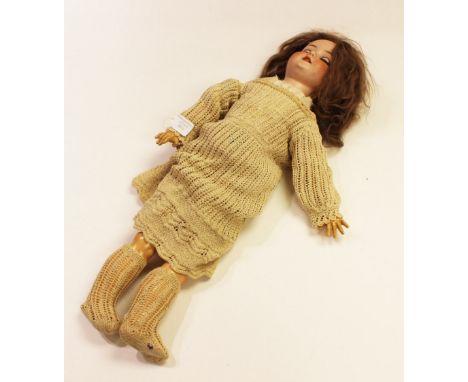 An SH (PB) bisque head doll, mould no 1909, 5 1/2 ", blue glass sleeping eyes, open mouth showing teeth, light brown wig, com