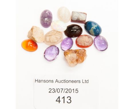 A collection of polished cabachon/facetted gemstones and cameos including four amethyst, opal, etc 