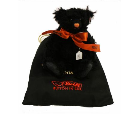 A Steiff limited edition QVC 2008 Year bear in black mohair, wearing orange ribbon, no 231 of 1500, model no 662638, with bla