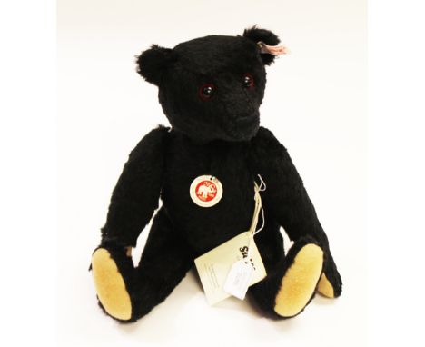 A boxed Steiff limited edition Titanic commemorative teddy bear, no 1076 of 1912, model no 664151, with original outer packag