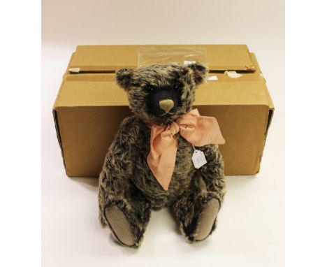 A boxed Steiff limited edition British Collectors Teddy Bear 2007 'Old Black Bear' grey tipped, 40cm, wearing pink ribbon, wi