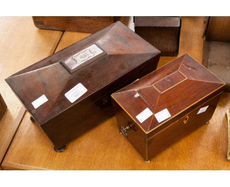An early Victorian rosewood sarcophagus tea caddy on bun feet, lacks internal fittings; together with another similar smaller