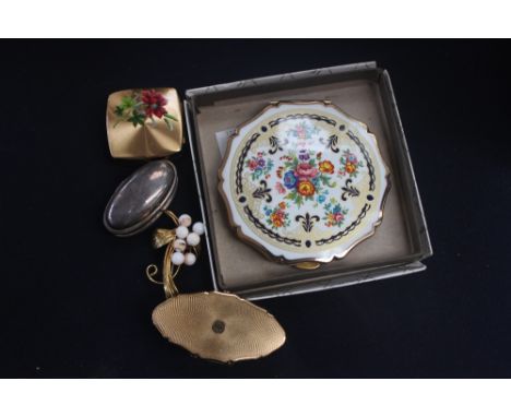 A boxed and mint Stratton compact, 1960's lipstick holder, 1960's cigarette ash holder, costume brooch and .925 silver pill b
