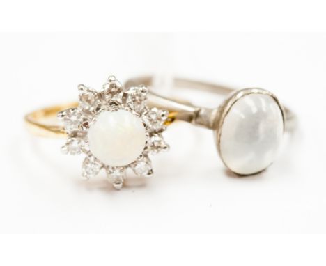 ***REOFFER AUGUST £200/300** An opal and diamond cluster ring and a moonstone ring 