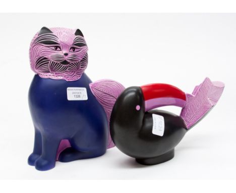 A Goebel two tone purple glazed seated cat; together with a similar Goebel Toucan figure (2) 