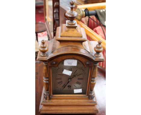 German bracket clock made by H.A.C, late 19th early 20th Century walnut case with 3 finials, silver faced with 8 day time pie