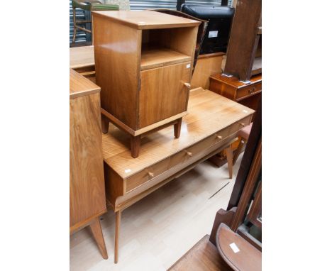 A mid 20th Century teak dressing table, together with a similar stool, a bedside cabinet and a bedstead (3)