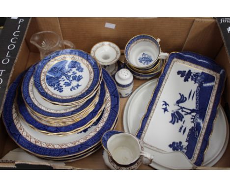 A quantity of Royal Doulton Real Old Willow pattern dinner ware, including plates, cups, pepper, candlestick, trays, etc 