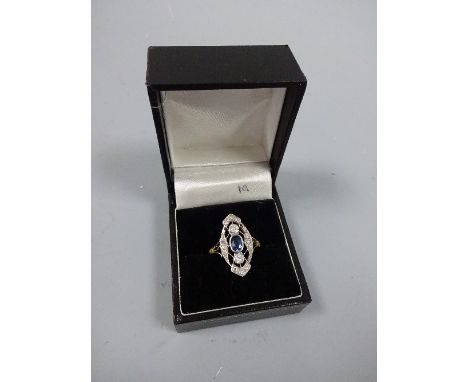 A SAPPHIRE AND DIAMOND RING, of openwork design with central sapphire within a surround of old-cut diamonds, stamped 18ct, ri