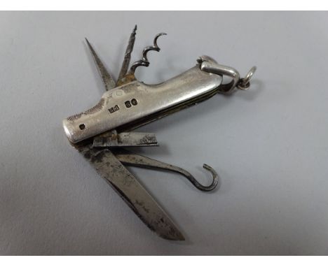 A NOVELTY SILVER S. MORDAN & CO SWISS ARMY STYLE KNIFE/MULTI TOOL, having button hook, corkscrew, knives etc, loop attachment