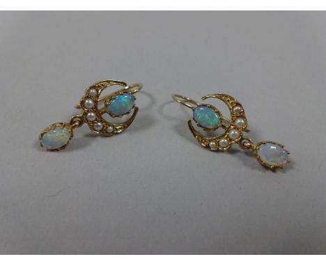 A PAIR OF OPAL AND PEARL EARRINGS, with opals within a pearl crescent moon design to further opal dropper